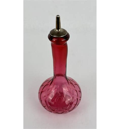 At Auction Fenton Quilted Cranberry Glass Barber Bottle