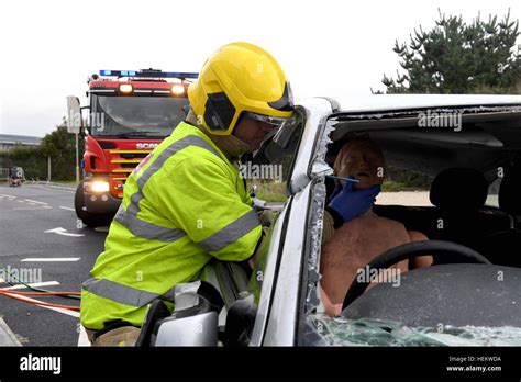 Firefighter Uk With Victim Of Fire Hi Res Stock Photography And Images