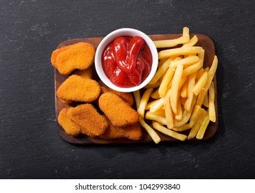 Chicken Nuggets French Fries On Dark Stock Photo 1042993840 | Shutterstock