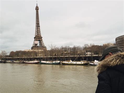 Parisian French Man Watching The Flooding Swollen Seine River Editorial