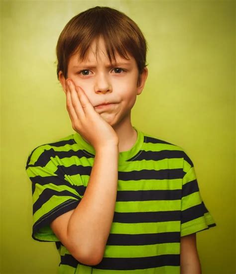 Sad face kids | A Kid`s Sad Face — Stock Photo © yelo34 #5035713