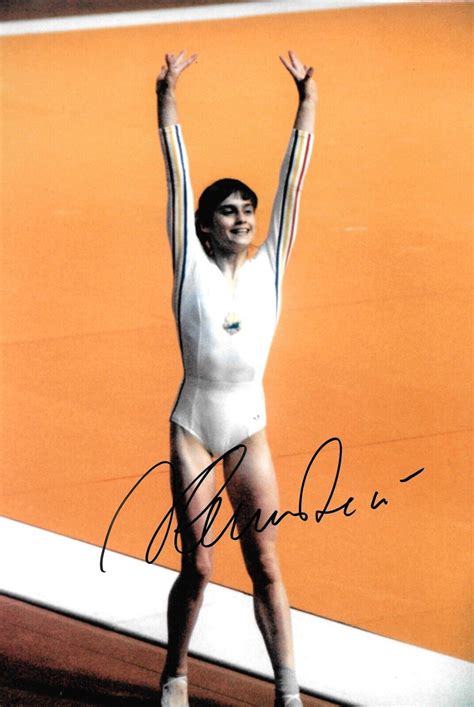 Nadia Comaneci Romania Celebrates Winning The Olympic Final Signed 12x8