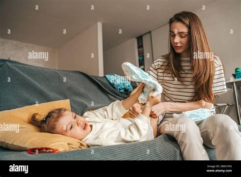 Changing Diaper Hi Res Stock Photography And Images Alamy