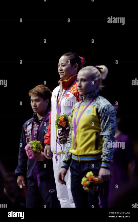 Gold Medalist Xueying Li Of China Center Stands With Silver Medalist