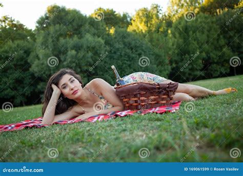 Brunette Woman On Picnic Blanket In The Park Stock Image Image Of Girl Lies