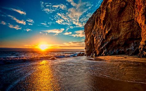 Sunset Serenity Hd Wallpaper Of Ocean Cliffs And Sandy Beach