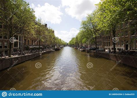 Traditional Gracht Town Canal In The City Of Amsterdam Stock Photo