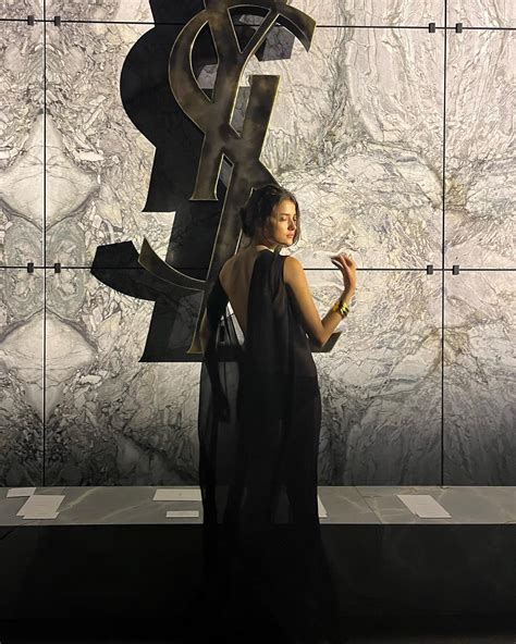 Blanca Soler in a stunning sheer dress at the YSL show in Paris (2023