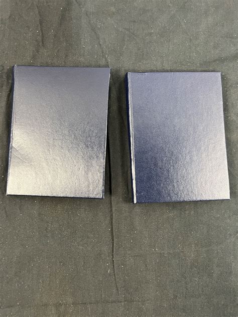 2 Royal Canadian Mint Coin Sets - Sunrise Estate Services Ltd