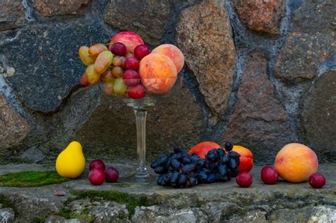 Premium Photo Still Life Of Fruits Rich Harvest Peaches And Grapes