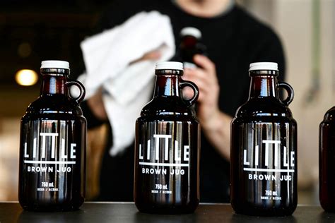 grand opening  brown jug  exchange district biz