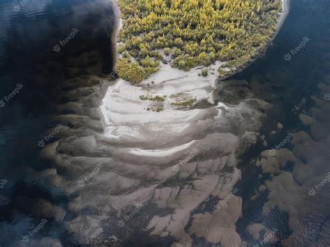 Premium Photo Aerial View Of A Sandy Island Overgrown With Trees And