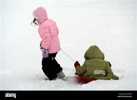 WInter outdoor snow games for children Stock Photo - Alamy