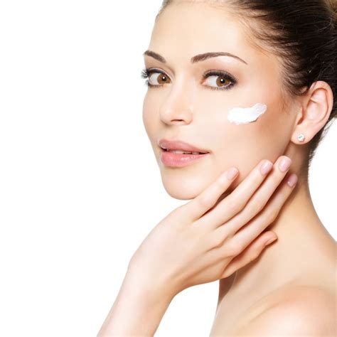 Free Photo Young Woman With Cosmetic Cream On A Clean Fresh Face