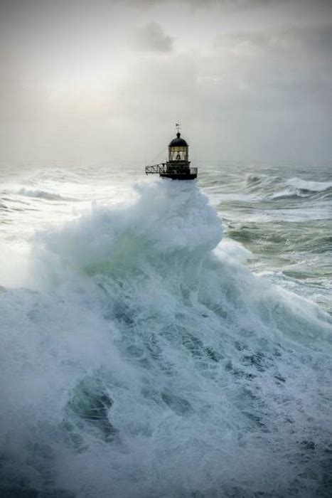 Lighthouse and waves | MATTHEW'S ISLAND