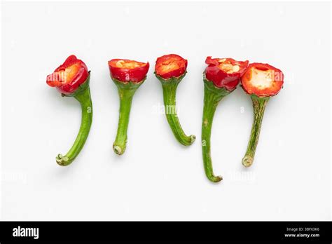 Hot Red Pepper Tails On White Background Cut Parts Of Capsicum Chilli Pepper With Seeds And