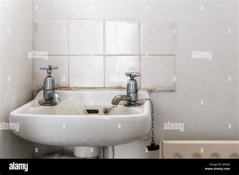 Water Basin With Separate Hot And Cold Water Taps As Used In Britain Stock Photo Alamy