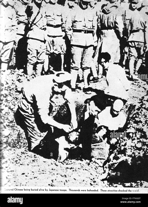 Photograph Of A Captured Chinese Soldier Being Buried Alive By Japanese