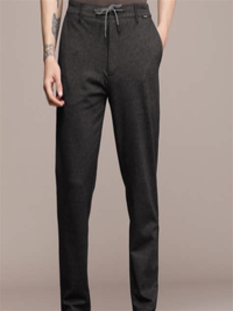 Buy Calvin Klein Jeans Men Black Self Design Regular Trousers