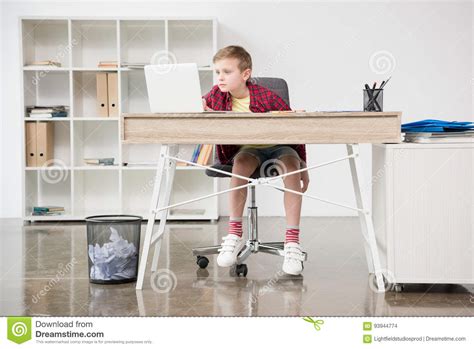 Schoolboy Using Fathers Laptop At Office Stock Photo Image Of Laptop