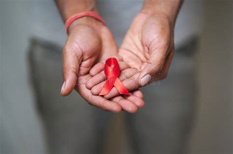 Worlds Hiv Aids Day Men Holding A Red Ribbon In His Hand Hiv Aids