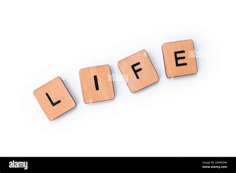 The Word LIFE Spelt With Wooden Letter Tiles Stock Photo Alamy