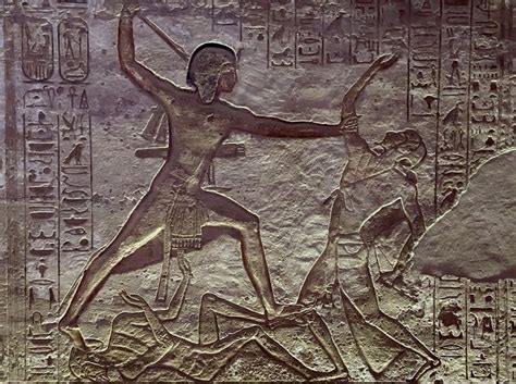 An Ancient Egyptian Relief Depicting The God And His Son Osirit In Egypt