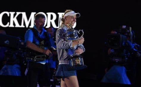 Emotional Wozniacki wins first Grand Slam title at Australian Open