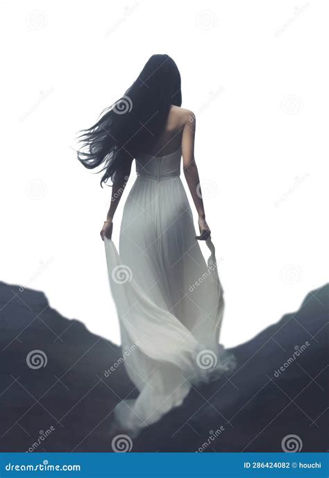 Full View Of A Pretty Young Woman Wearing A Long White Dress With A