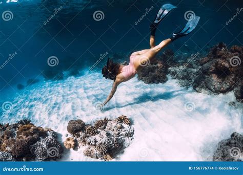 Woman Freediver Dive With Fins Near Corals Freediving Underwater In