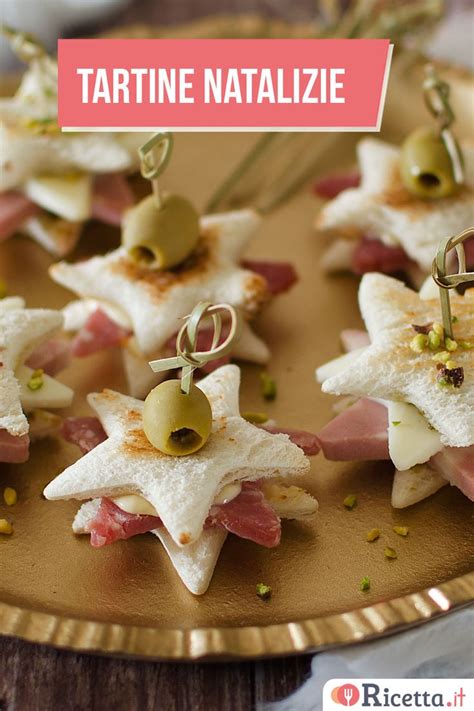 Small Appetizers With Olives And Ham Are Arranged On A Gold Platter