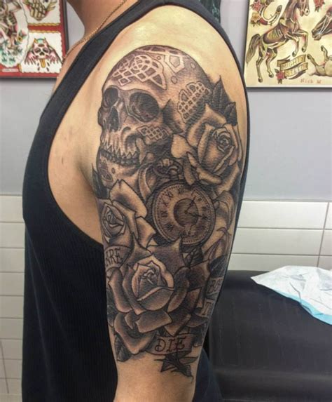 Skull And Roses Half Sleeve Tattoo