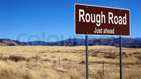 Rough Road brown road sign | Stock image | Colourbox