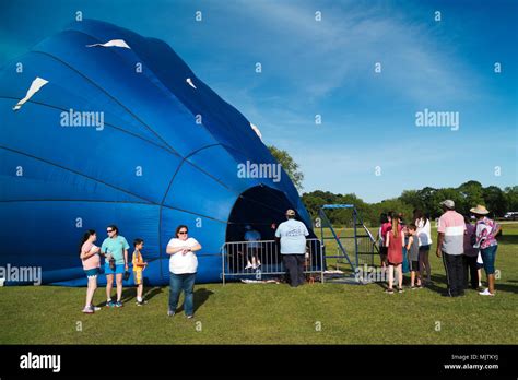 People Lined Up To Walk Inside A Partially Inflated Hot Air Balloon At The Th Annual Hot Air