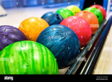 Colorful Bowling Balls In Return Machine Stock Photo Alamy