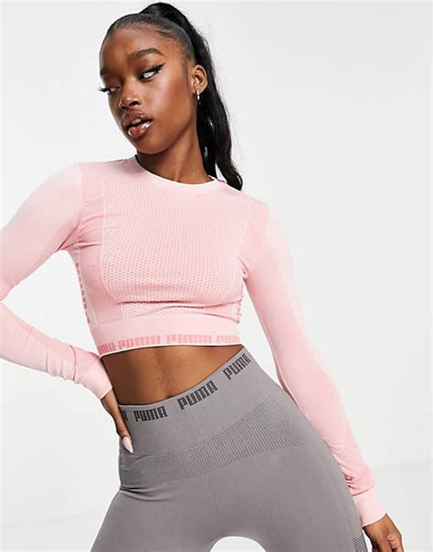 Puma Training Evoknit Seamless Long Sleeve Crop Top In Soft Pink Asos