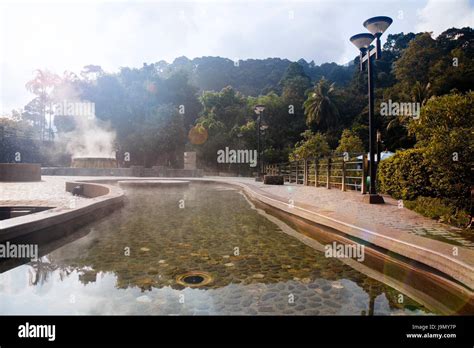 Volcanic Natural Hot Spring Mineral Water Pool With Steam Spa And Sun Reflect Light Travel