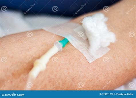 Intravenous Drug Administration in the Clinic. Treatment with a Stock Photo - Image of emergency ...