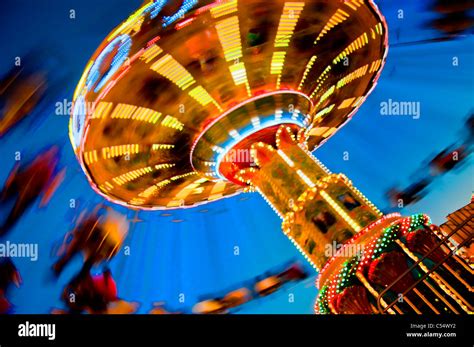 Low Angle View Of A Chain Swing Ride In New Mexico State Fair New