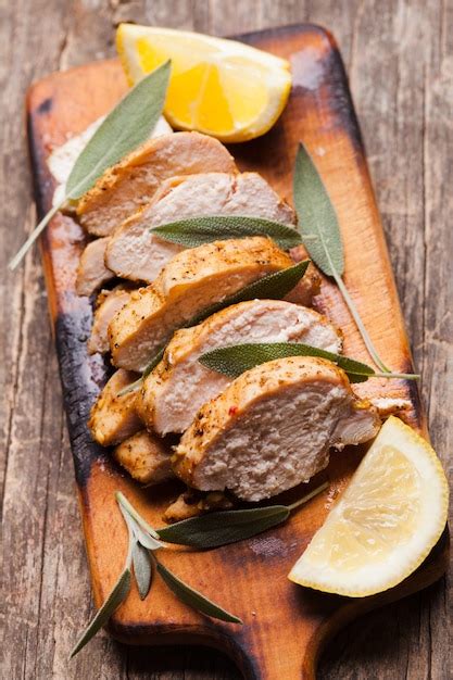 Premium Photo Spicy Baked Chicken Breast With Sage And Lemon