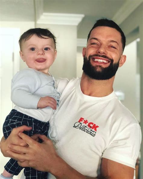 Wwe Superstar Finn B Lor Fergal Devitt Holding His Adorable Nephew