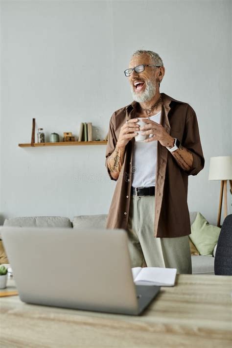 A Mature Gay Man With Tattoos Stock Photo Image Of Technology Happy