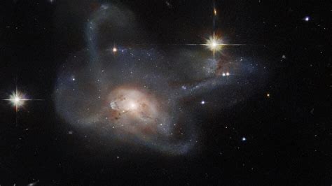 Hubble Takes A Stunning Photo Of Two Galaxies Merging