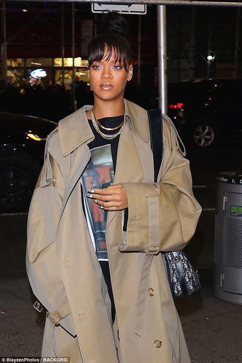 Rihanna Sports Oversize Trench Coat And Top Knot In Nyc Rihanna