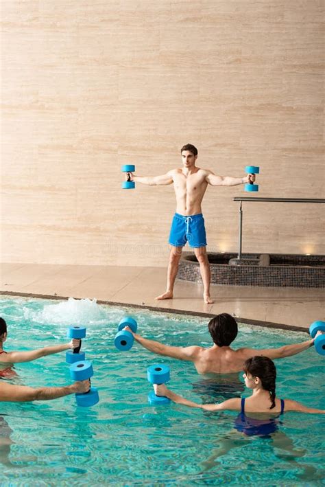 Trainer Holding Dumbbells During Water Aerobics Stock Photo Image Of