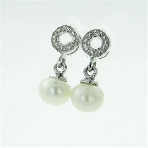 Sterling Silver Pearl Drop And Diamond Accent Earrings