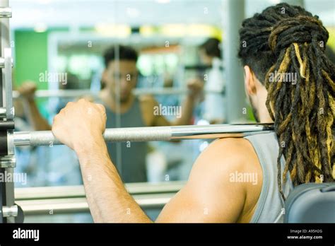 Man Lifting Barbell Stock Photo Alamy