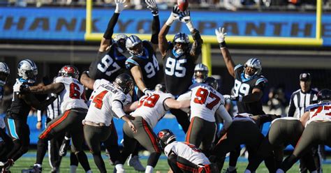 Bucs Clinch Nfc South Earn Playoff Berth With 9 0 Win Over Panthers Wusf