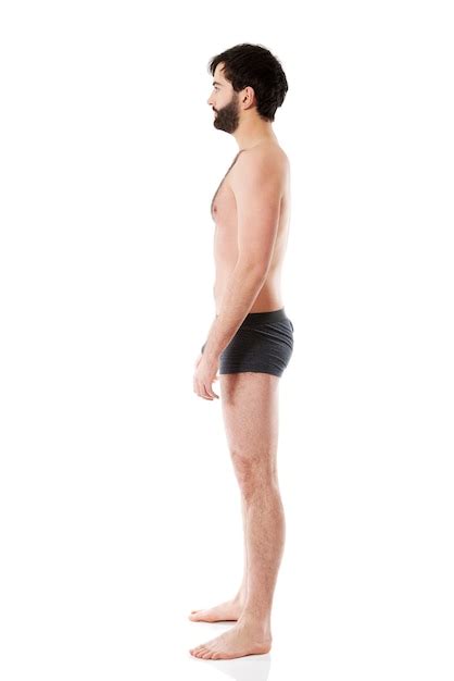 Premium Photo Profile View Of Man Wearing Underwear Against White