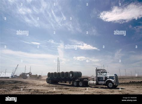 Delivery of pipes. Denver Airport runway construction, Colorado, USA ...